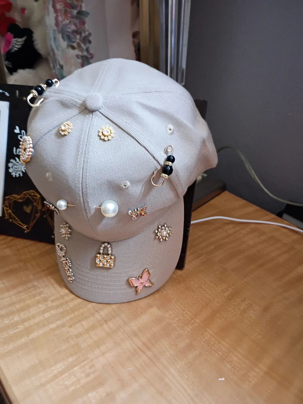 Embellished Beige Baseball Cap with Pearl & Charm Accents